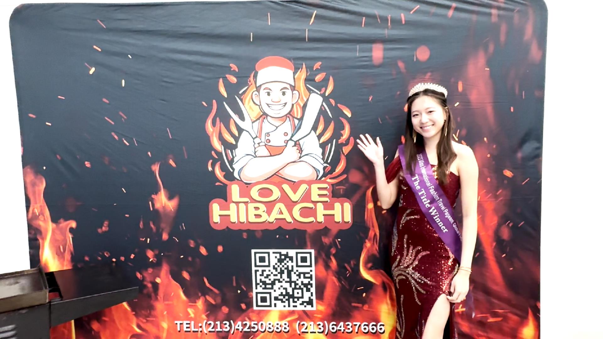 A tiny laptop in the palm of a hand