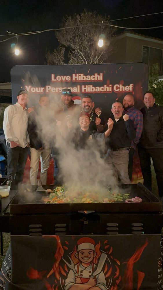 A tiny laptop in the palm of a hand